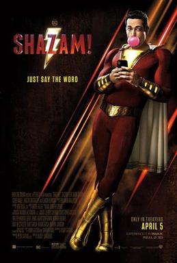 Shazam uses his phone while blowing bubblegum. To his left, the words "Shazam!" and "Just Say The Word" can be seen.