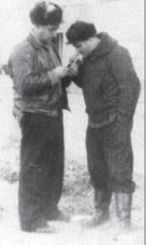 256th IAP navigator and pilot Viktor Kalmanson and 523rd IAP ace Grigory Okhay at Miaogou airfield, February 1952 Kolmanson and Okhay Miaogou Feb 1952.png