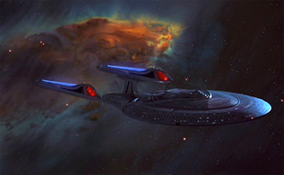 The new Sovereign-class Enterprise-E was designed to be sleeker than its predecessor.[6] The ship was the last element added to the above scene; the computer-generated nebula background was built first, with the starship composited in later.[52]