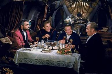 Dinner aboard the Nautilus. From left to right: James Mason, Kirk Douglas, Peter Lorre, and Paul Lukas.