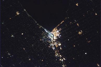 Sarnia from space, this time at night – Taken by Chris Hadfield, the only astronaut from Sarnia, who wanted to snap a photo of his hometown from the International Space Station. Before the flyover, Hadfield arranged with the citizens of Sarnia via Twitter and Facebook to turn on all their lights both inside and outside their homes.[47][48]