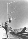 Leah Rosenfeld adjusting a train order hoop at Hiland, California, in 1973