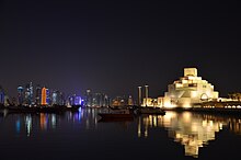 The Museum of Islamic Art with Doha skyline in the background MIAatNight.jpg