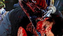 An example of the film's computer generated gore effects. SummerOfMassacreKill.jpg