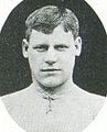 Short-haired young white man in a sports jersey