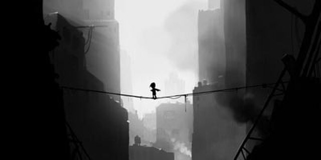 A pre-release development screenshot, showing the boy crossing a dangerous chasm on a rope bridge. The game's art style and presentation have been con