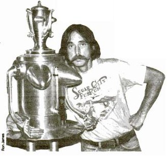 "Sweetheart", shown with its creator, Clayton Bailey; the busty feminine robot (also a functional coffee maker) created a controversy after it was dis