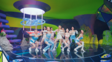 A scene in the music video where Twice is dancing in an abstract Y2K-themed set. TWICE - Talk that Talk (music video screenshot).png
