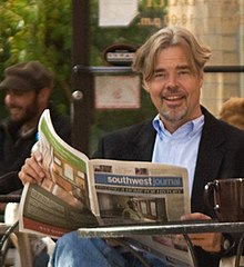 Jay Walljasper at Minneapolis street cafe with local newspaper Jay-Walljasper-2020.jpg