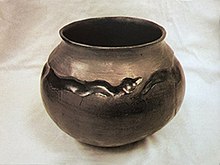 From a series of twelve pots by Sara Fina Tafoya, one of the earliest pots made at Santa Clara Pueblo with a carved Avanyu design, c. 1900-1910. Denver Art Museum Carved black-on-black pot by Tewa artist Sara Fina Tafoya, early 20th C.jpg