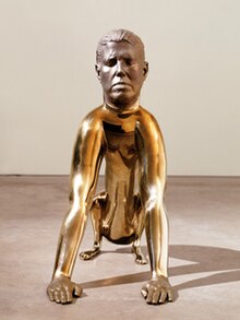 Dog, created between 1998 and 2001, displays the core elements of Pondick's human-animal hybrids. Here, the artist's head and hands are combined with a dog's body, cast in highly polished stainless steel. Dog sculpture by Rona Pondick.jpg
