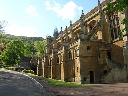 The college chapel with the Porter's Lodge and the Malvern Hills in the background