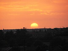 Sunset across Sedgeford to the Norfolk coast from Magazine Wood Peddars Way