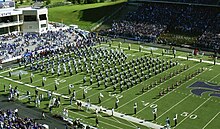 Kansas State University Marching Band marching on the football field at Bill Snyder Family Stadium in Manhattan, Kansas KSU MB block.jpg