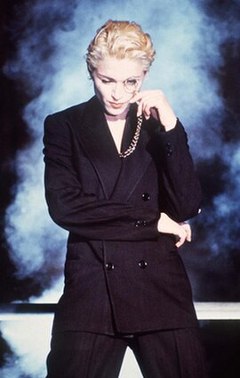 Madonna portraying a masculine persona in the music video for "Express Yourself"