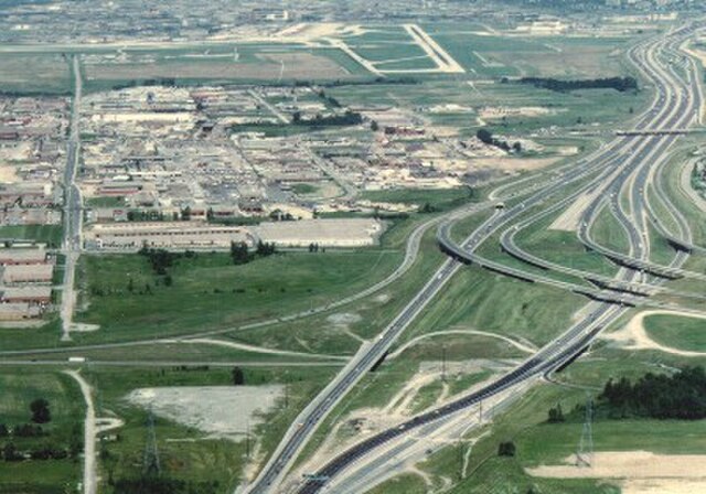 The Highway 401-403-410 interchange looking east in 1987. Before 1990, Highway 410 did not connect with Highway 403, and existed as a Super two north 