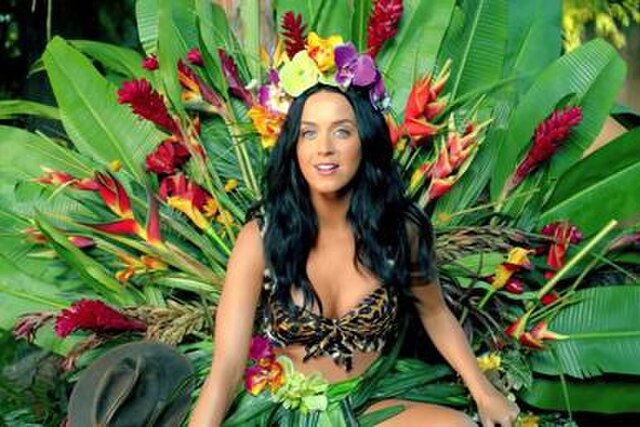 Perry in the music video for "Roar" dressed as "Queen of the Jungle".