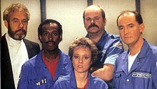 The cast of Star Cops.
Left to right: Jonathan Adams, Erick Ray Evans, Linda Newton, Trevor Cooper and David Calder StarCopsCast.jpg