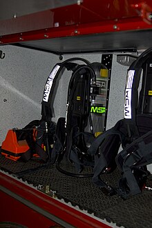 SCBA packs carried on a rack in a firetruck SCBA TruckMount JDiPierro.jpg