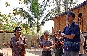 Villagers participate in traditional Lao dance Don kho dance.jpg