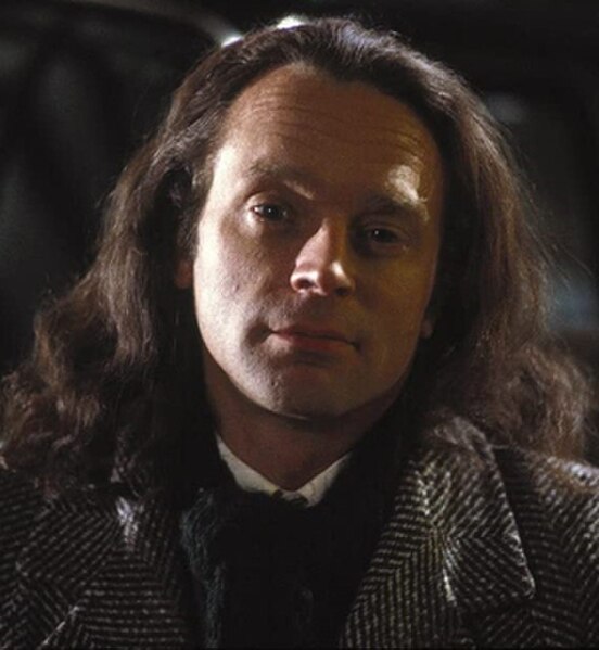 Brad Dourif as Charles Lee Ray, the Lakeshore Strangler, in Child's Play (1988).