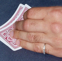 Professional poker player "California" Abe's pinky ring, made of platinum and diamonds, which he wears when playing cards. Pinky ring.png