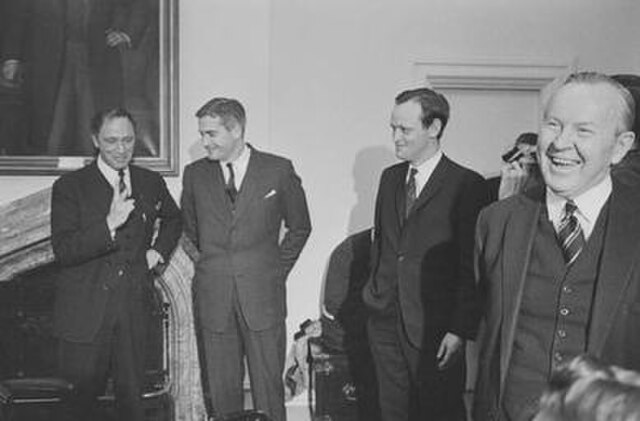 Chrétien, second from right as a minister in Lester Pearson's Cabinet in 1967. From left to right, Pierre Trudeau, John Turner, Chrétien, and Pearson.