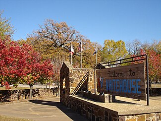 The Welcome to Whitehouse sign is built from rock used in the old "rock school house." The school house and other public works were built during the Great Depression by the Works Progress Administration (WPA). The sign itself was made and donated by local resident Lynn Canfield. WCP i 9 12 wiki.jpg