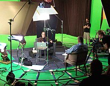 Ray Kurzweil being interviewed by Barry Ptolemy on the set of Transcendent Man TM Prod Still2.jpg