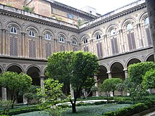 The courtyard. The first floor shuttered windows correspond to a four-sided gallery, housing the collection's main paintings. Doria Pamphilj Court yard.JPG