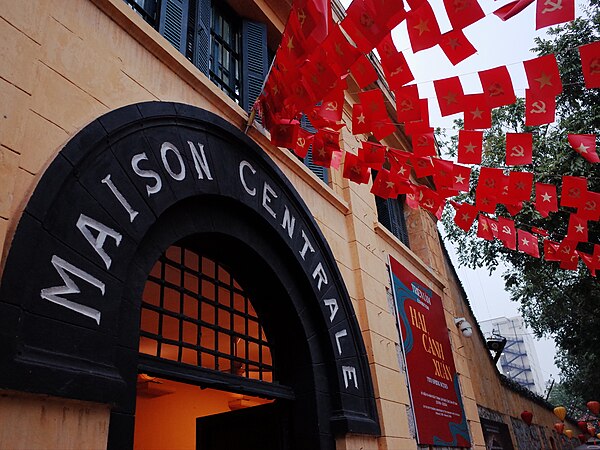 The French name "Maison Centrale" above the gate of Hỏa Lò