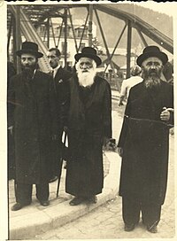 Rabbi Mendel Rubin of Seret (center) son of Reb Shmuel Schmelke, seen with his son Rabbi Moses Josef Rubin (right) and son in law Rabbi Sholom Lamm (left). Rebbe R. Mendele.jpg