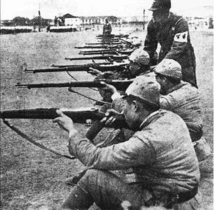 Reformed Government troops undergoing training with Hanyang 88 rifles under a Japanese instructor