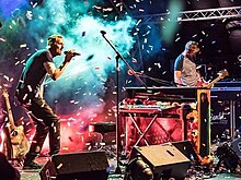 Coldplace (pictured in 2018) are the oldest known Coldplay tribute act, with over 400 concerts performed Coldplace in 2018.jpg