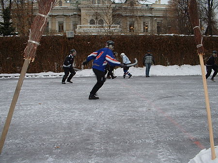 A friendly game of broomball at the British Ambassador's Residence in Moscow. Players were drawn from the British Embassy "Ice Pirates" team and visiting friends who had not encountered broomball before. The broomsticks at the sides of the picture are simply for decoration. MoscowBroomball.jpg