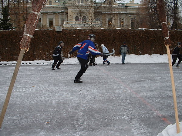 A friendly game of broomball at the British Ambassador's Residence in Moscow. Players were drawn from the British Embassy "Ice Pirates" team and visiting friends who had not encountered broomball before. The broomsticks at the sides of the picture are simply for decoration.