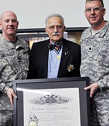 The 1-126th Aviation battalion of the Rhode Island National Guard was recognized by the OFPA in 2012. The certificate is being presented by Governor John Eastman of the Rhode Island Society. OFPA Award Presentation.jpg