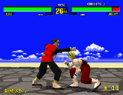 Virtua Fighter (1993) was the first 3D fighting game. It is typical of most fighting games in that action takes place in a two-dimensional plane of motion. Here, one player ducks the other's attack. Virtua Fighter.png