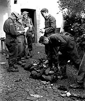 Soldiers of the Seaforth Highlanders of Canada searching German prisoners near the Moro River, 8 December 1943 Moro-captured.jpg