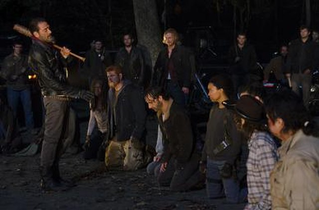 Rick and his group kneel before Negan