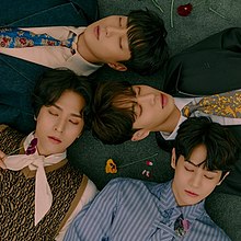 Highlight members lying down with their eyes closed. From top, clockwise: Yoon Dujun, Lee Gikwang, Yang Yoseob, Son Dongwoon.
