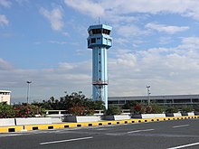 The airport's control tower in front of Terminal 2.