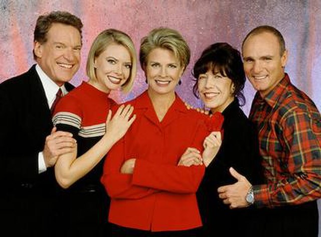 The cast of Murphy Brown for its final two seasons. Lily Tomlin is pictured fourth from the left.