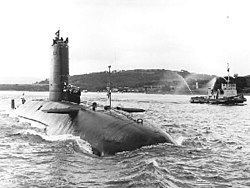 HMS Conqueror returning to Faslane Naval Base after the war, flying the Jolly Roger to signal her sinking of ARA General Belgrano HMS Conqueror (S48).jpg