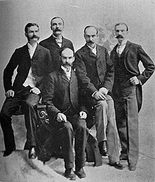 The Ball brothers from left to right: William Charles Ball (1852-1921), Frank Clayton Ball (1857-1943), Lucius Lorenzo Ball (seated) (1850-1932), Edmund Burke Ball (1855-1925), George Alexander Ball (1862-1955) Ball Brothers 2.jpg