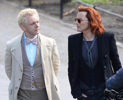 Sheen as Aziraphale and Tennant as Crowley while filming.