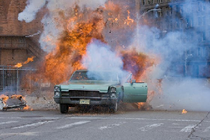 The destruction of Greene's car. As with many scenes, the explosion couldn't be re-shot. KilltheIrishman.movie.effects.png