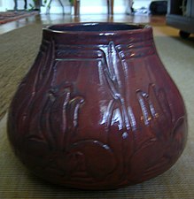 Newcomb College Pottery vase potted by Joseph Meyer and decorated by Sara Levy from 1905