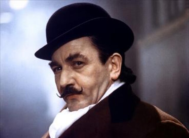 Albert Finney as Poirot in the 1974 film, Murder on the Orient Express