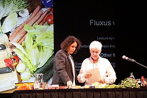 Alison Knowles (right) performing one of her pieces on stage with her daughter Hannah Higgins at the Fluxus Semicentenary in San Francisco, CA in September, 2011 Knowles and higgins.JPG